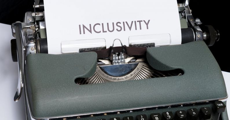 Inclusivity - White Paper with Text on Green Vintage Typewriter