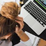 Workplace Learning - Woman Sitting in Front of Macbook