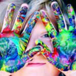 Personalization - A KId With Multicolored Hand Paint