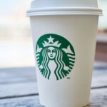 Branding - Closed White and Green Starbucks Disposable Cup